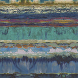 Detail of fabric in an abstract paint swatch print in shades of blue, turquoise and pink.