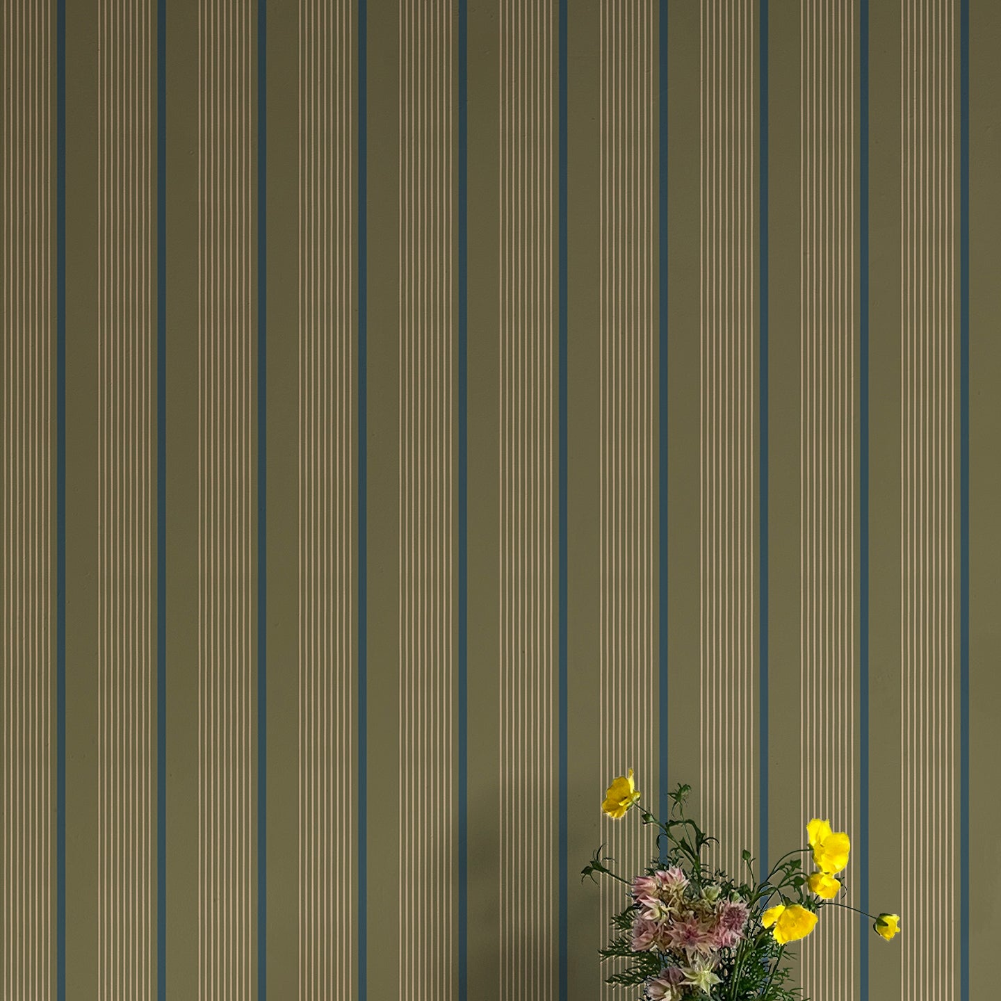 Vase of flowers against wallpaper with vertical stripes in green, blue and brown