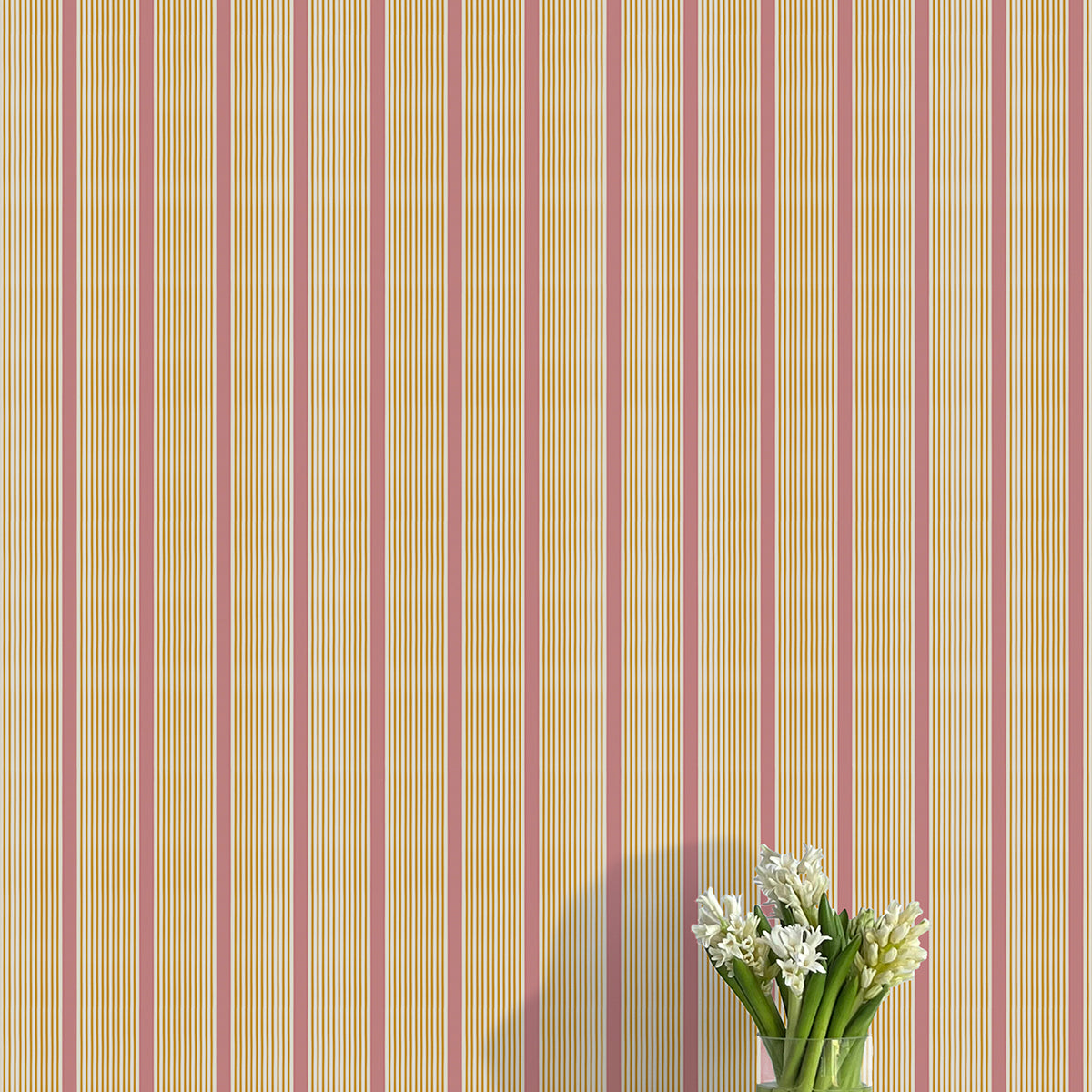Striped wallpaper with a vase of flowers on a flat surface