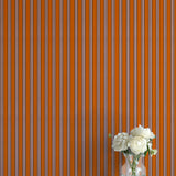 Striped wallpaper with a vase of flowers on a flat surface