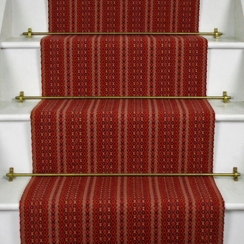 Striped flatweave runner in red on white staircase