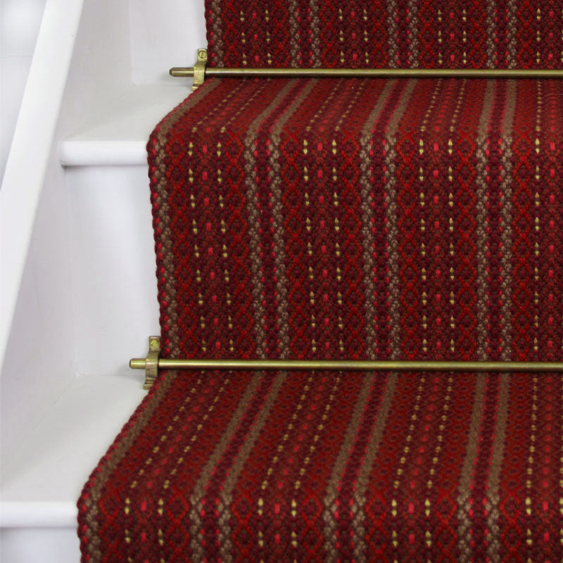 Striped flatweave runner in red on white staircase