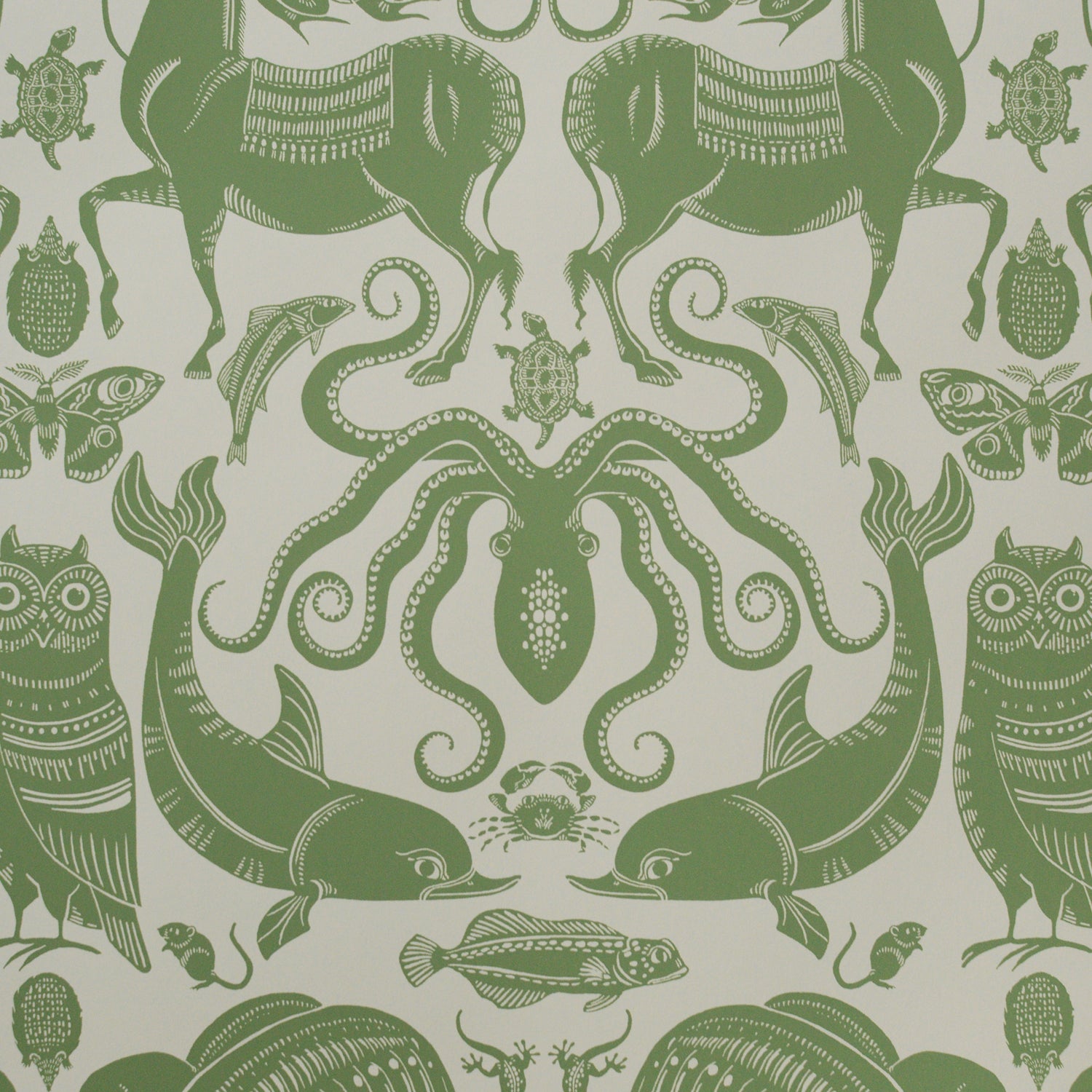 Patterned wallpaper with green animals and sea creatures on a beige background