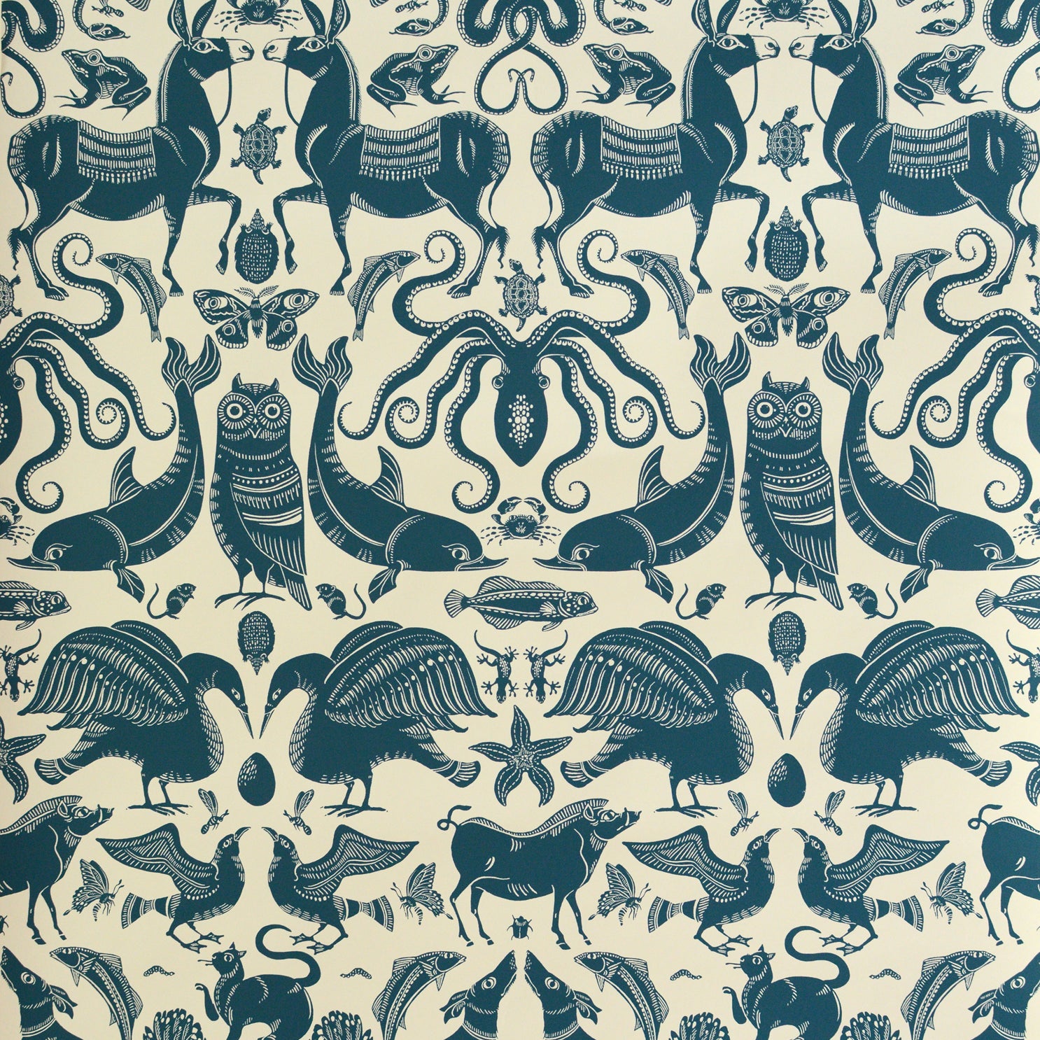 Wallpaper with animals and sea creatures in dark blue on a white background