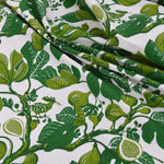 Green leaf pattern fabric on a white background