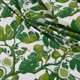 Green leaf pattern fabric on a white background