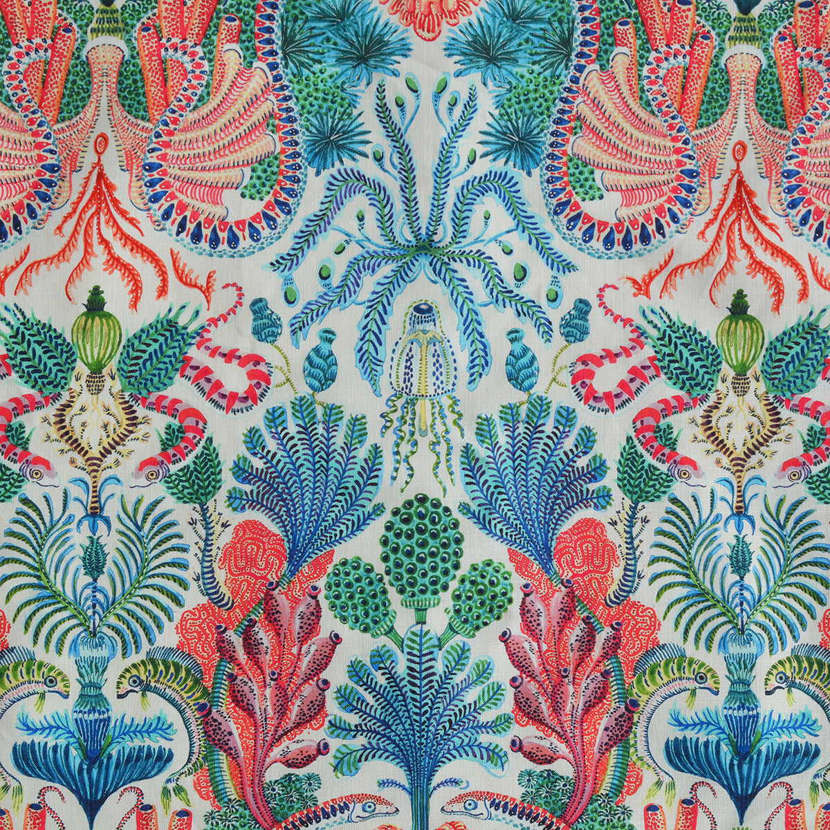 Colorful patterned fabric with intricate  coral oceanic plant designs on a white background
