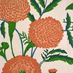 Pattern of orange flowers with green leaves on a beige background