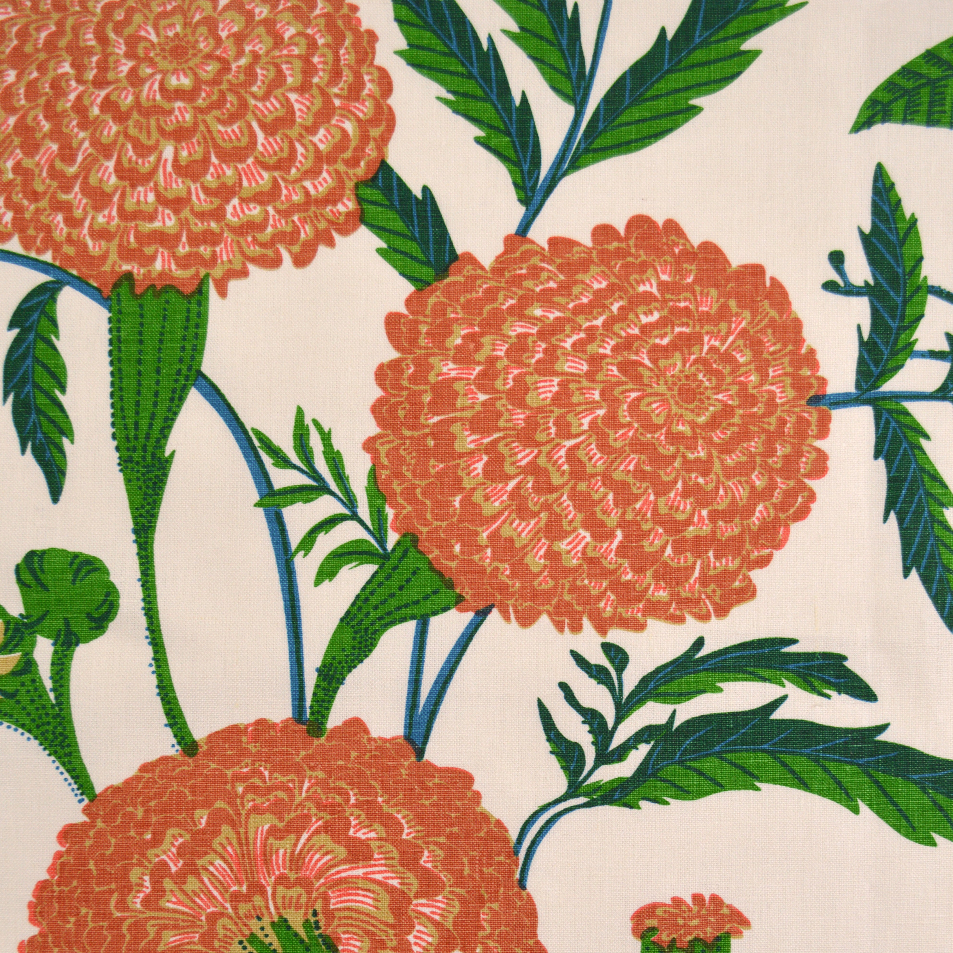 Pattern of orange flowers with green leaves on a beige background