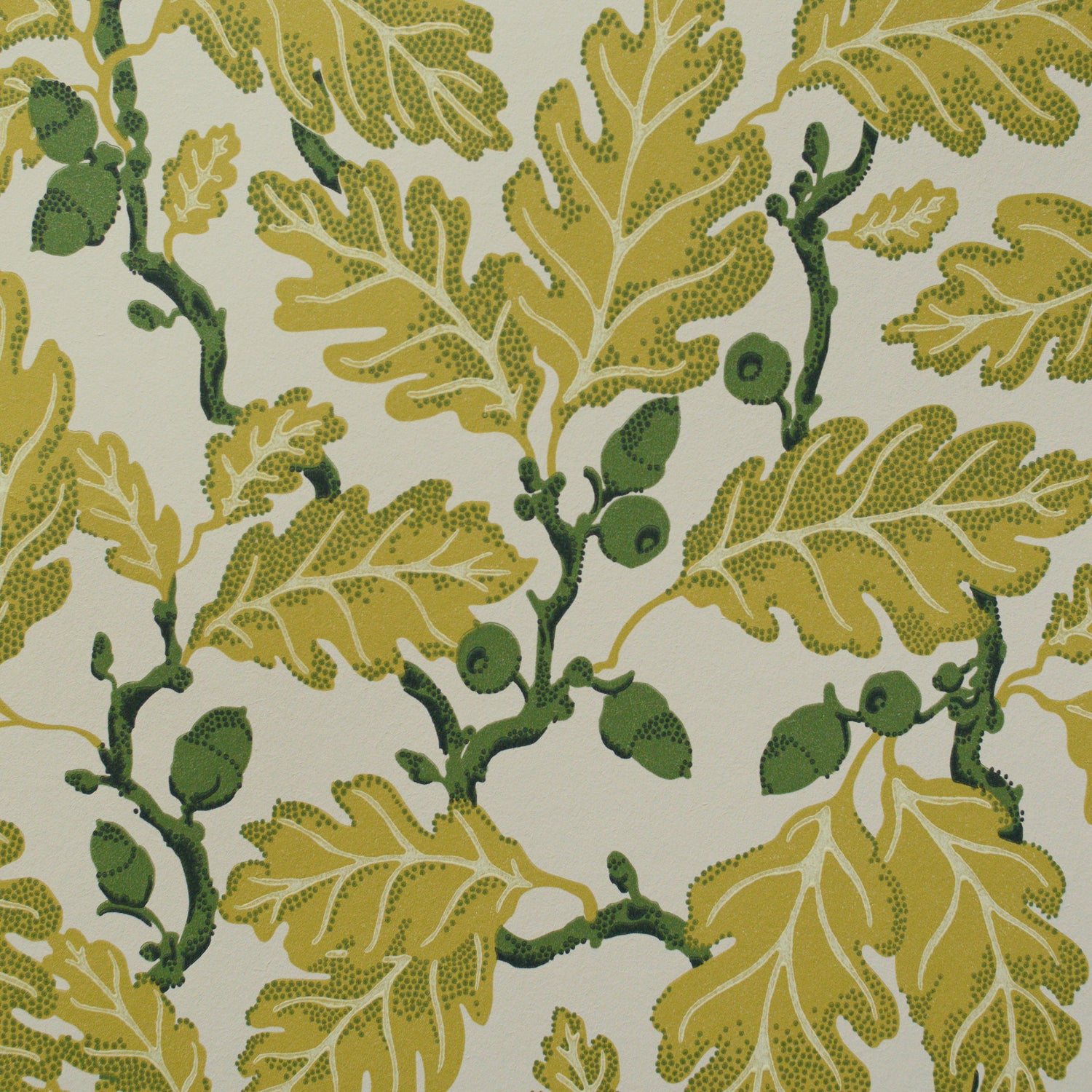 Pattern of green and yellow leaves on a white background