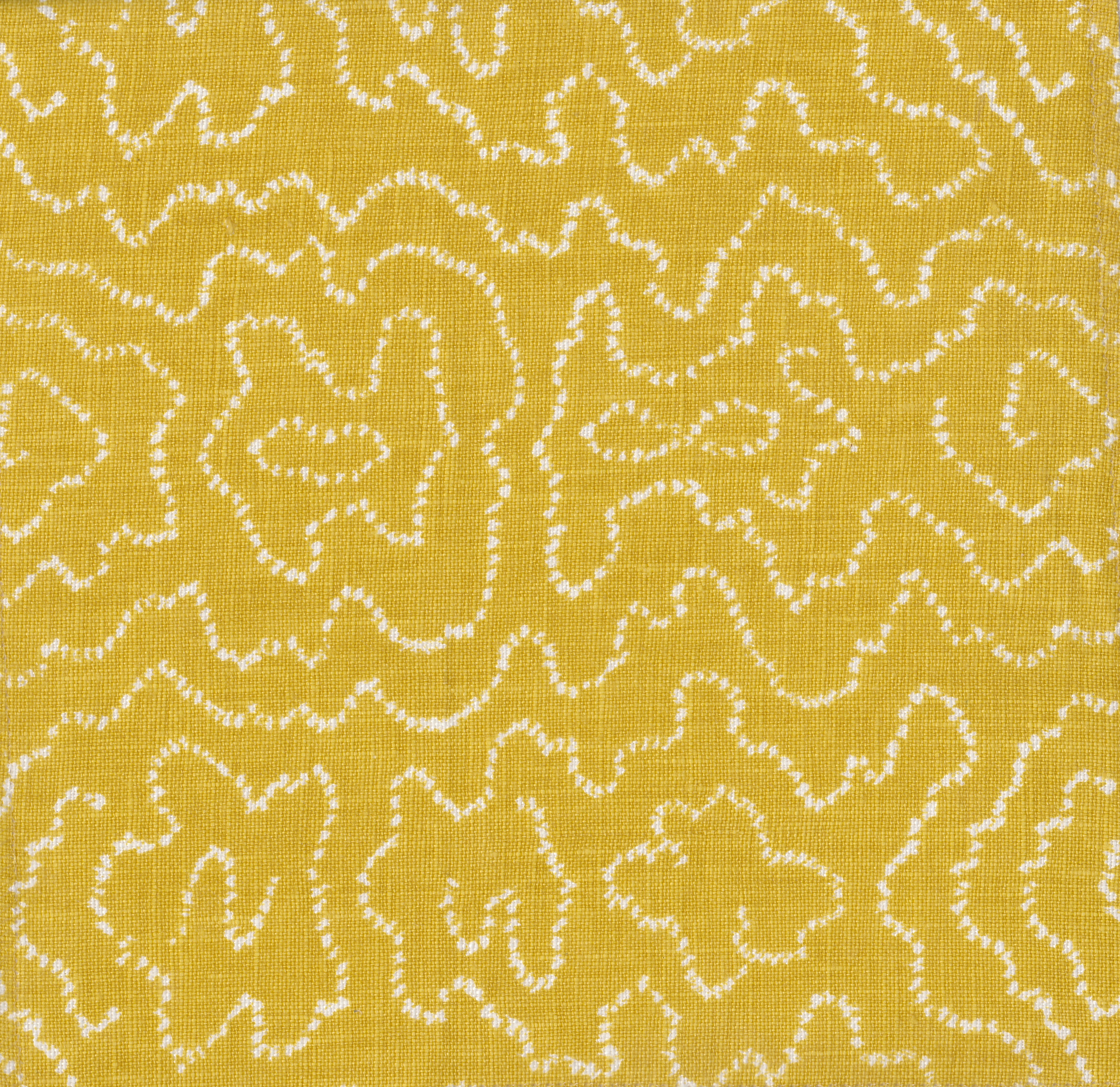 Detail of fabric in a minimalist wood grain print in white on a mustard field.