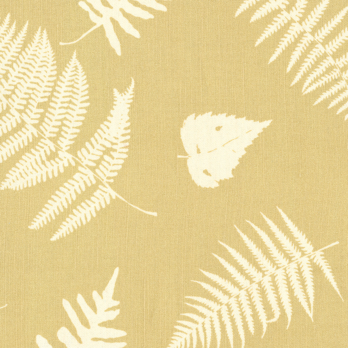 Detail of fabric in a repeating fern and dragonfly print in cream on a gold field.