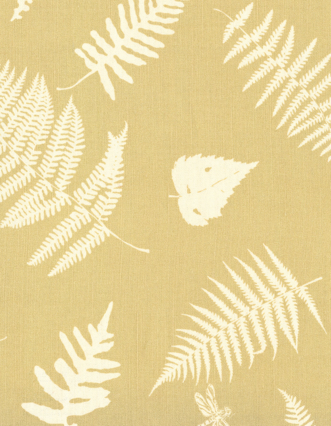 Detail of fabric in a repeating fern and dragonfly print in cream on a gold field.