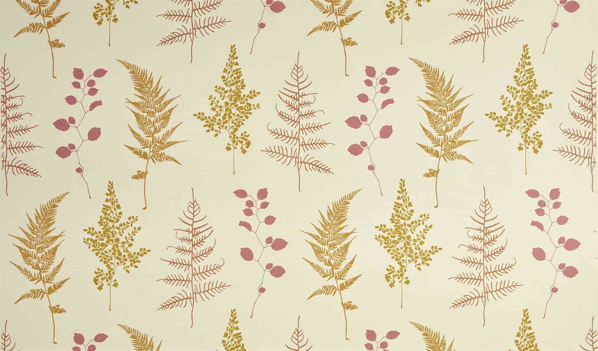 Detail of fabric in a repeating leaf print in pink and mustard on a cream field.