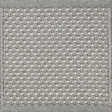 Close-up of woven carpet with a grid pattern in gray and white.