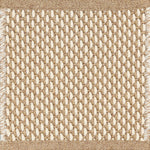 Close-up of woven carpet with a grid pattern tan and white.