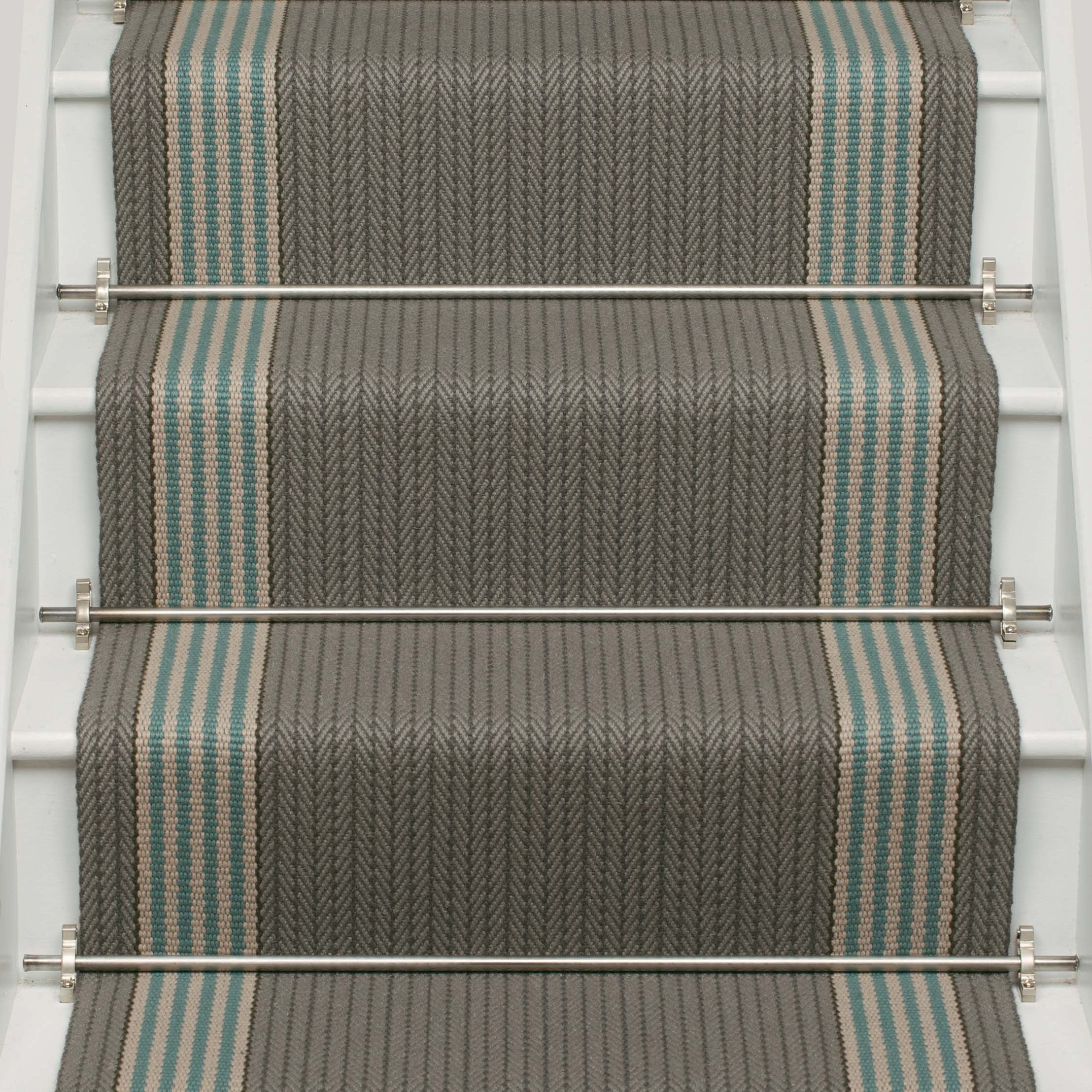 Striped flatweave runner in grey and blue on white staircase