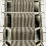 Striped flatweave runner in ivory and black on white staircase