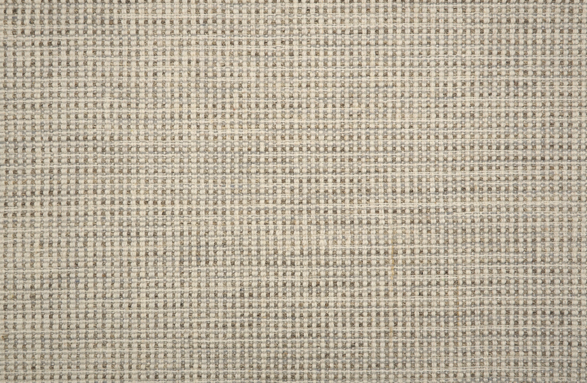 Broadloom carpet in a textural basketweave in cream and grey. 