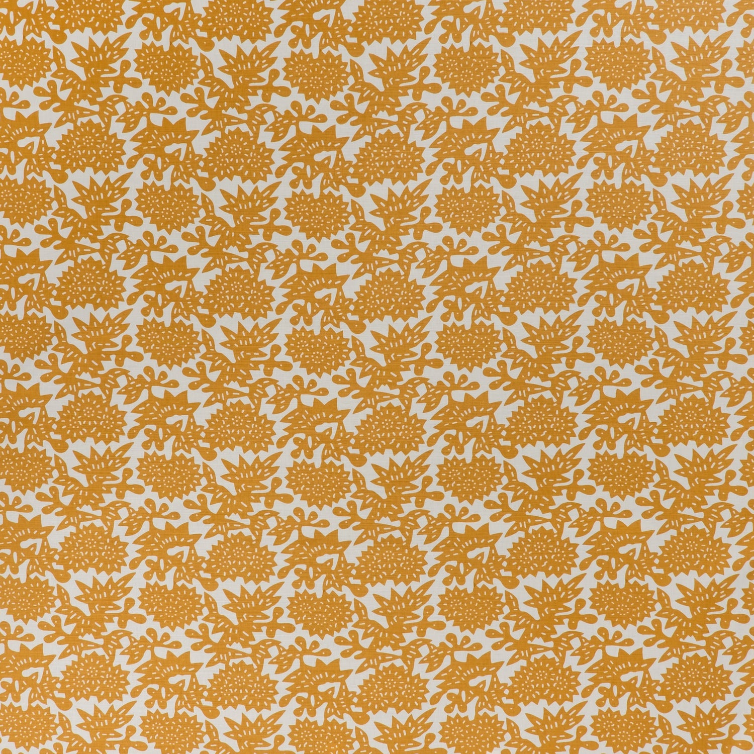 printed linen-cotton fabric in a repeating geometric flower pattern in burnt orange on a white field.