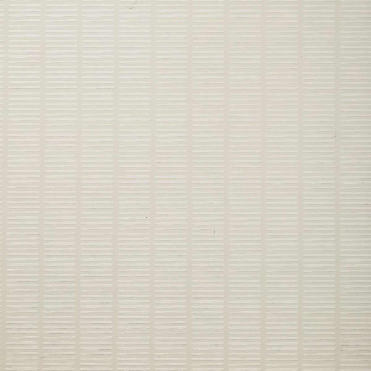 Detail of wallpaper in a textural stripe print in cream.