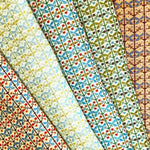 Collection woven floral fabrics in a range of colors.