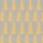 Detail of fabric in a linear leaf print in gold on a light gray field.