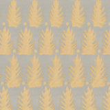 Detail of fabric in a linear leaf print in gold on a light gray field.