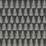 Detail of fabric in a linear leaf print in tan on a black field.