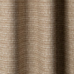 Draped linen fabric in a repeating abstract gridded pattern in tan on a cream field.