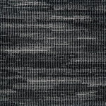 Broadloom carpet swatch in a textured pattern black white color