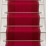 Striped flatweave runner in red on white staircase