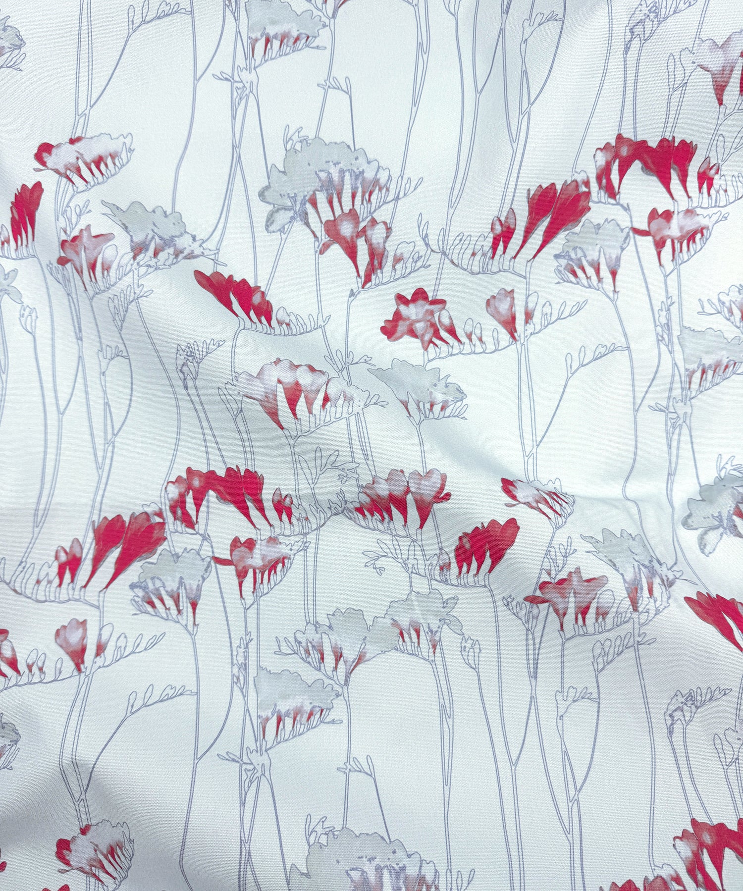 Floral pattern with red and gray flowers on a white background