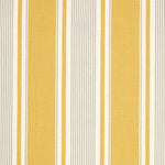 Detail of fabric in a classic stripe print in yellow and gray on a cream field.