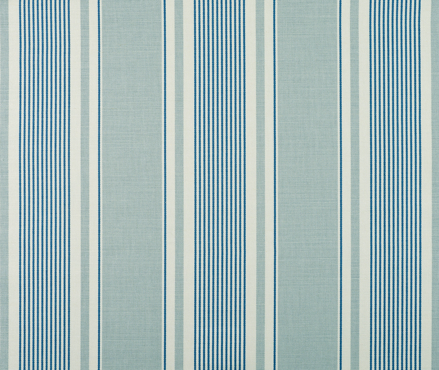 Detail of fabric in a classic stripe print in blue and turquoise on a cream field.