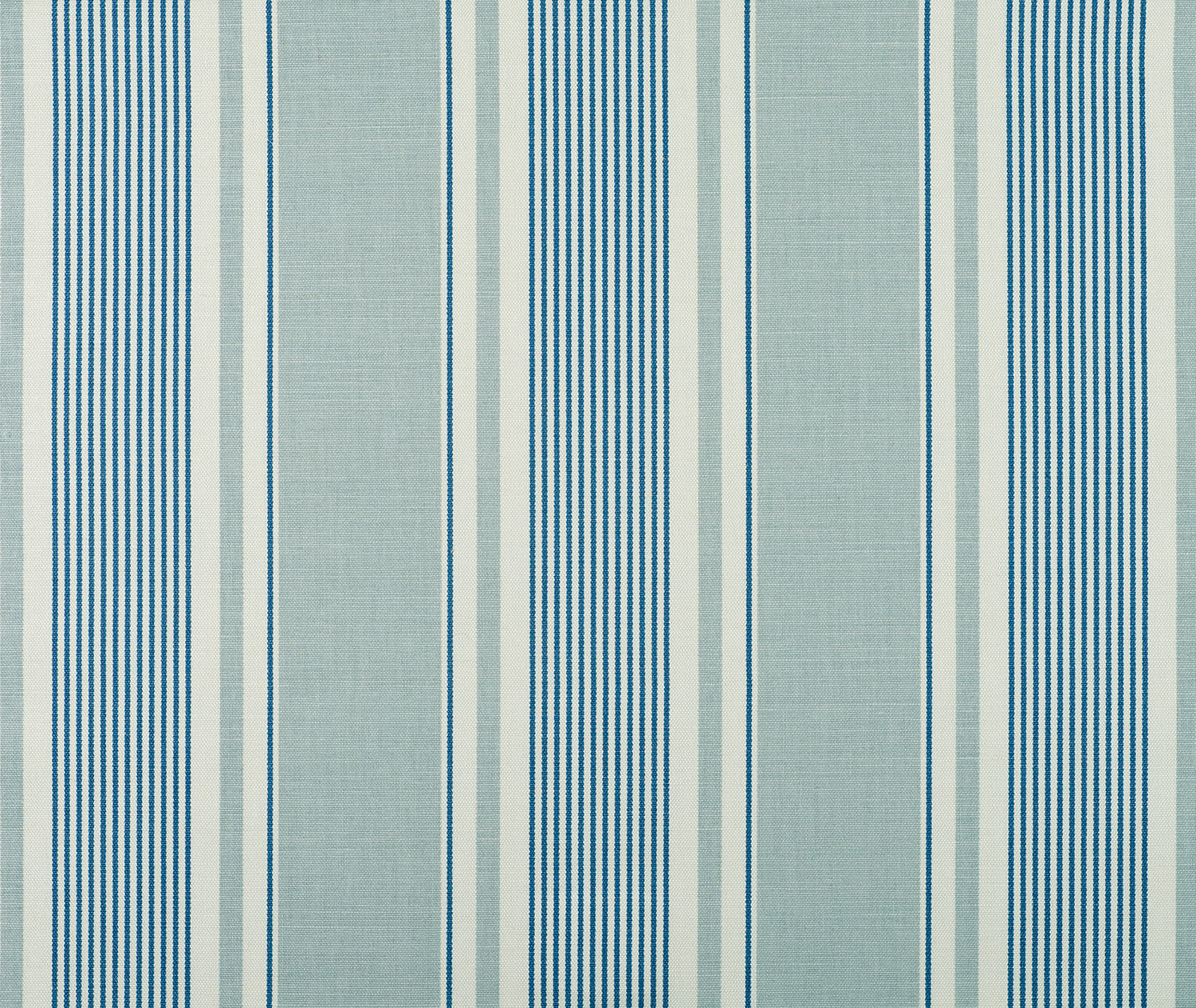 Detail of fabric in a classic stripe print in blue and turquoise on a cream field.