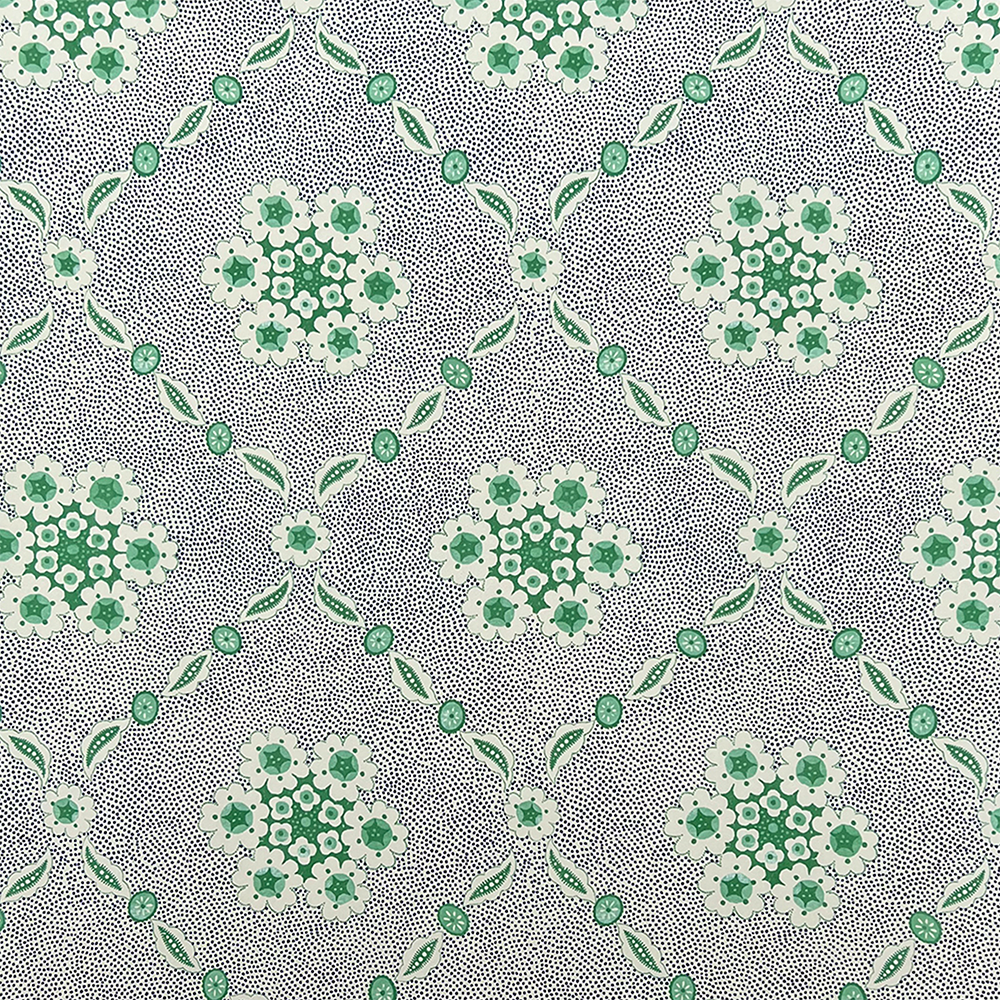 Detail of wallpaper in an intricate floral lattice print in green and gray on a cream field.