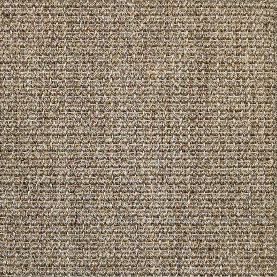 Broadloom carpet in textural woven sisal in brown.