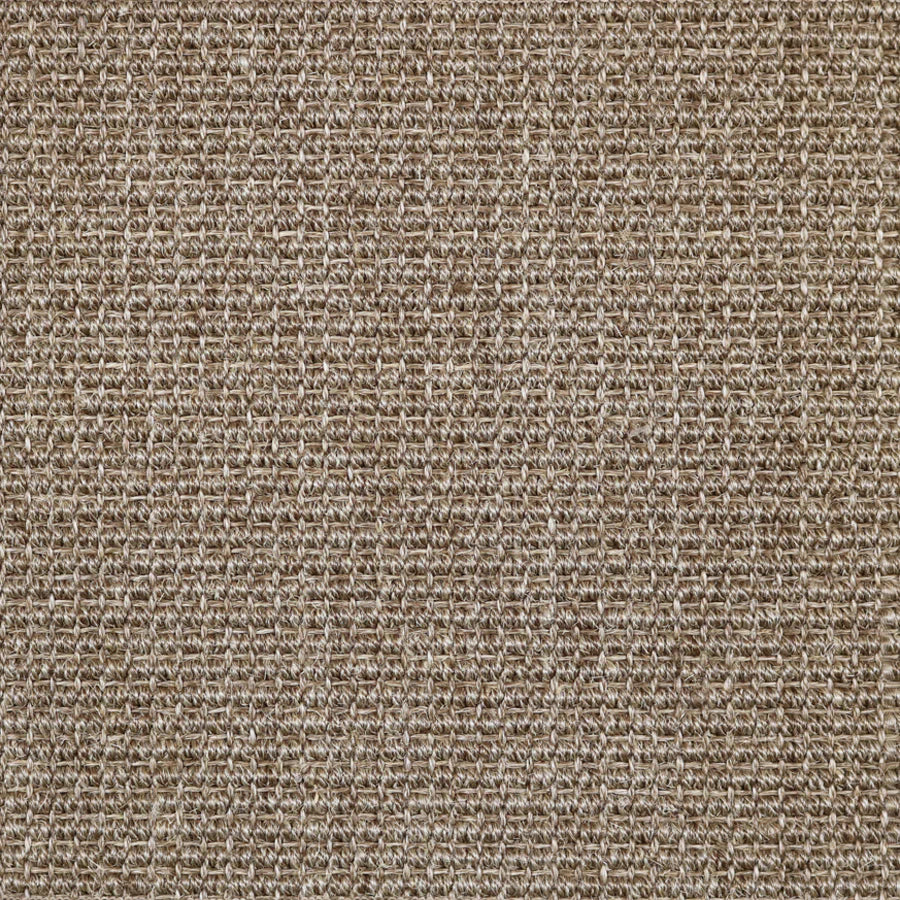 Broadloom carpet in textural woven sisal in taupe.