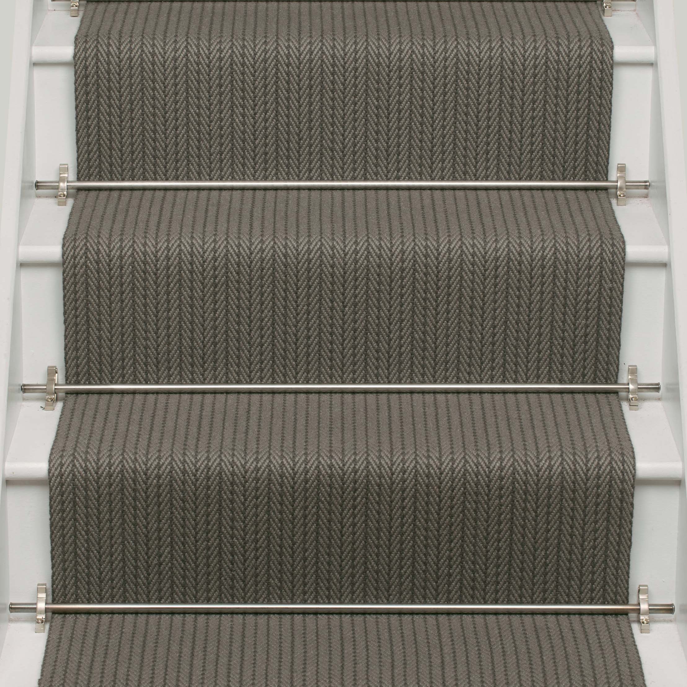 Striped flatweave runner in dark grey on white staircase