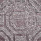 Close-up of textured metallic carpet with geometric pattern