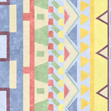 Detail of wallpaper in a playful geometric stripe in a rainbow of pastel shades.