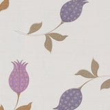 Detail of fabric with a large-scale tulip print in shades of purple and brown on a cream field.
