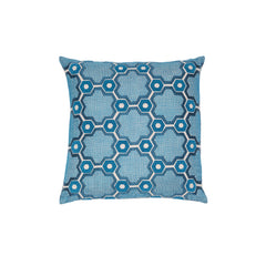 Square throw pillow with a geometric prism pattern embroidered in shades of blue on a white field.