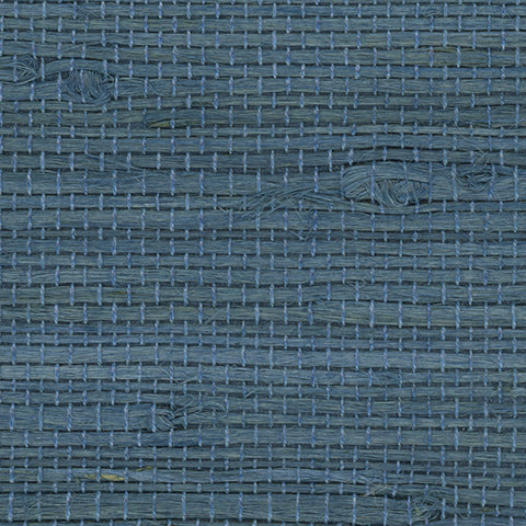 Detail of a jute grasscloth wallpaper in mottled navy blue.
