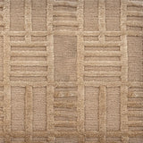 Detail of a Handknotted rug in beige with a raised linear pattern. 