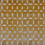 Detail of a Handknotted rug in yellow ochre in a raised square lattice against a white ground. 