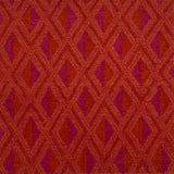 Detail of a woven high-pile rug in an interlocking diamond pattern in pink, red and orange