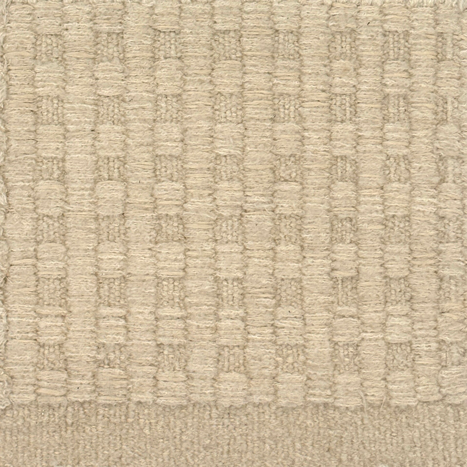 Textured beige checkerboard carpet 