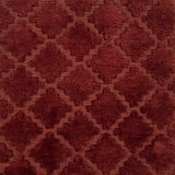 Close-up of a handknotted rust red fabric with a geometric pattern
